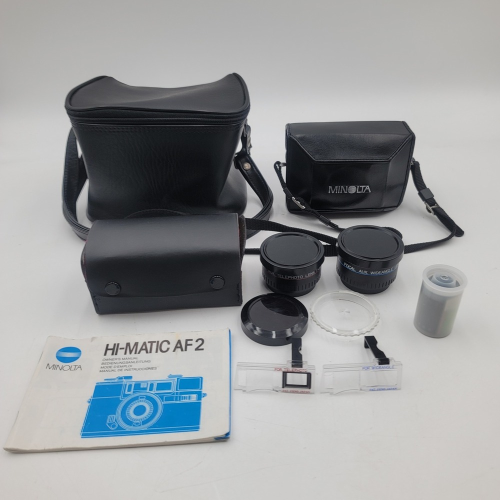 Minolta Hi-Matic AF2 35mm Film Camera Bundle with Aux Lenses Manual‎ and Case